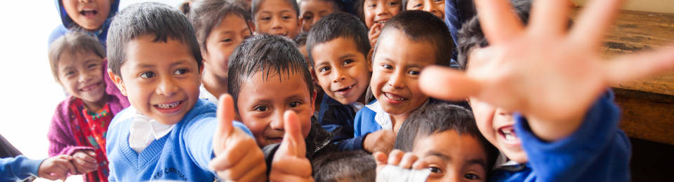 Guatemalan Kids with Smiles and Thumbs Up
