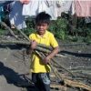 Eliseo collecting firewood