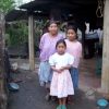 Evelin with her mother and sister