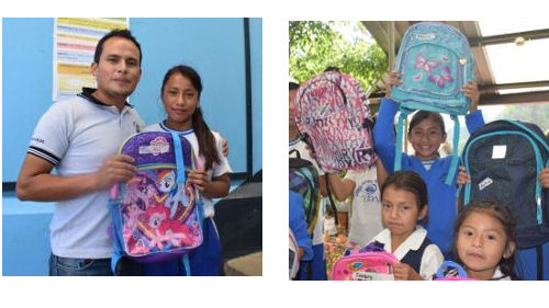 Vida students receiving backpacks