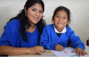 Alba with her teacher