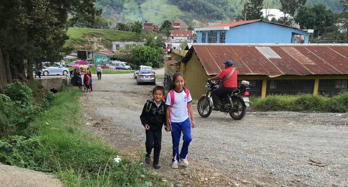 Keyser and his sister walking to school