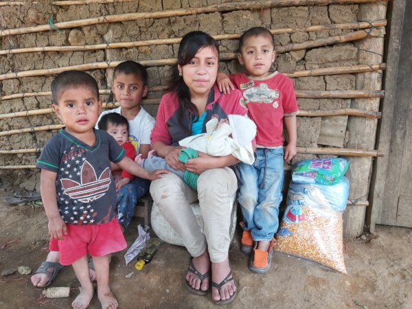 Family with gift of food